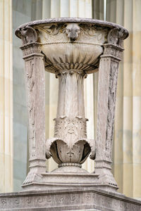 Close-up of statue against building