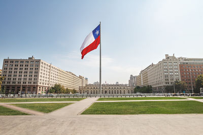 Low angle view of flag against sky