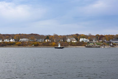 View of river with buildings in background