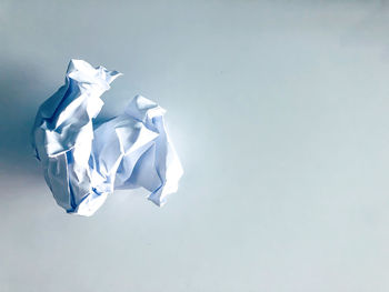 High angle view of paper against white background