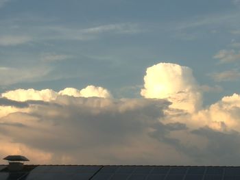 Low angle view of cloudy sky at sunset