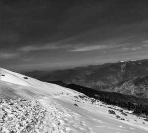 Scenic view of snowcapped mountains against sky