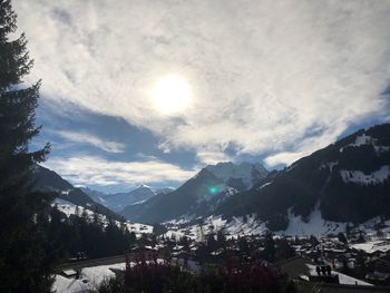 Scenic view of mountains against sky during winter