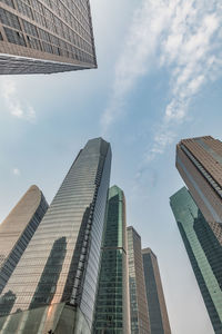 Low angle view of modern buildings against sky