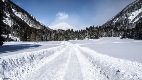 Snow covered mountain against sky