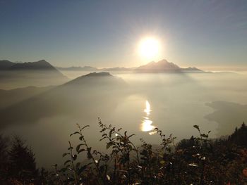 Scenic view of landscape against sky during sunset