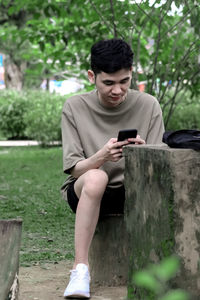 Young man using mobile phone