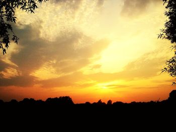 Scenic view of dramatic sky during sunset