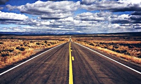 Road amidst landscape against sky