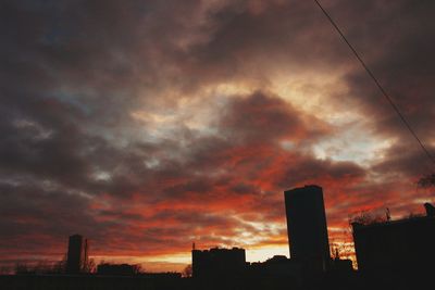 Low angle view of cloudy sky at sunset