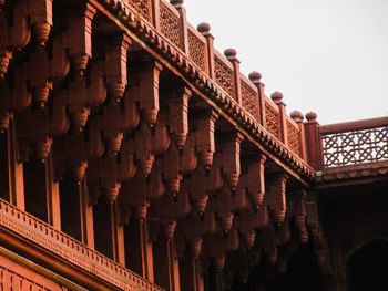 Low angle view of ornate building against sky