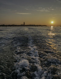 Scenic view of sea against sky during sunset