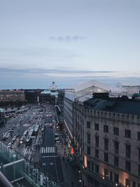 High angle view of street and buildings against sky