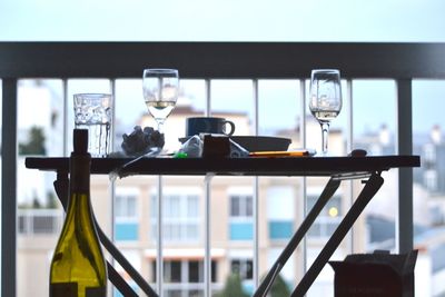 Close-up of wine bottles on table