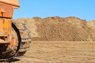 Bulldozer in sand