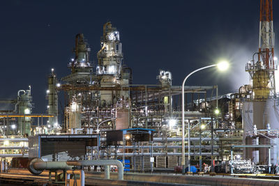 Illuminated buildings in city at night