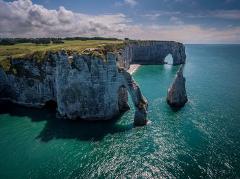 Panoramic view of sea against cloudy sky