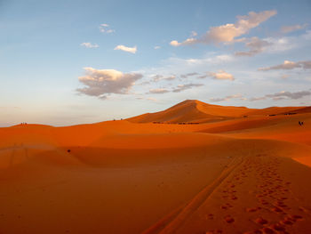 Scenic view of desert against sky