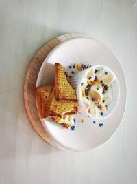 High angle view of dessert in plate on table