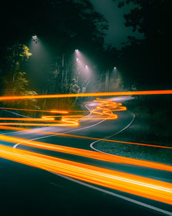 Light trails on road at night