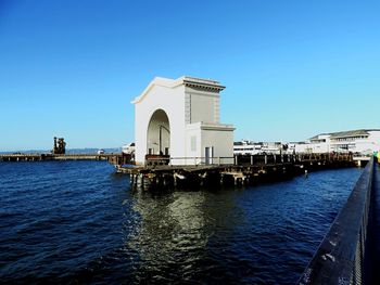 View of built structures against clear sky