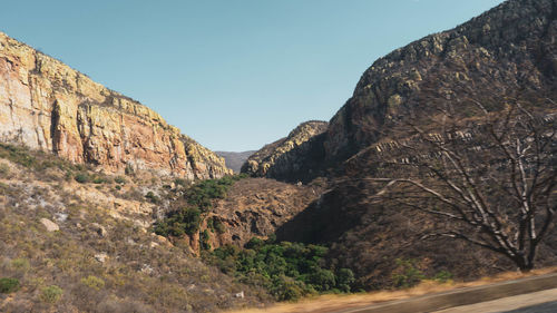 Scenic view of mountains against clear sky