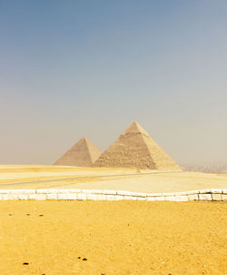 Giza pyramids against sky