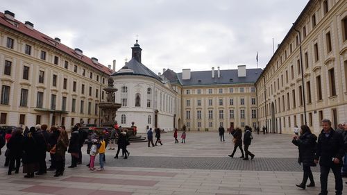 Tourists in front of building