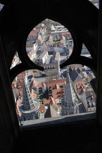 View of cityscape through window