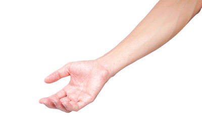 Close-up of hand over white background