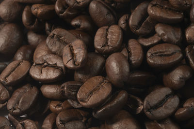 Freshly roasted coffee beans background. top view