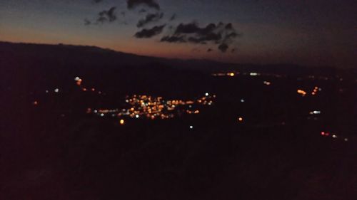 Illuminated cityscape at night