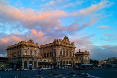 View of buildings against cloudy sky