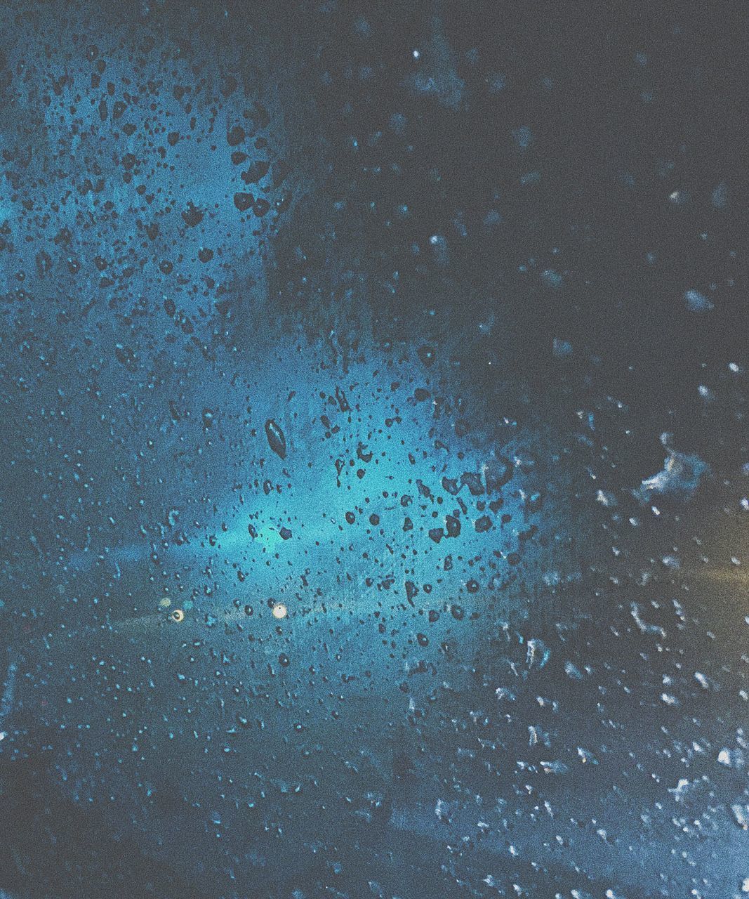 FULL FRAME SHOT OF WINDOW WITH WATER DROPS