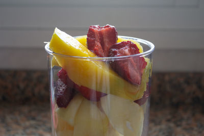 Close-up of fruits in glass on table