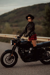 Portrait of woman riding motorcycle