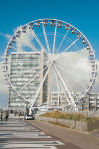 View of ferris wheel in city