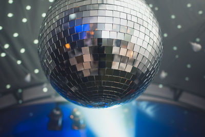 Low angle view of disco ball