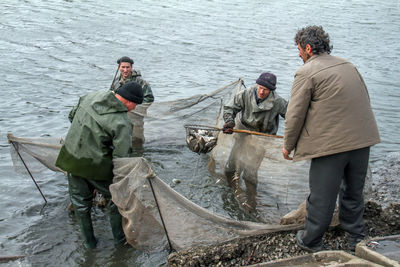 Men working in river