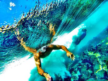 Woman swimming in sea