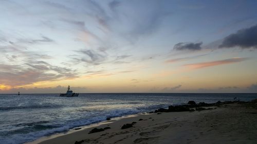 Scenic view of sea at sunset