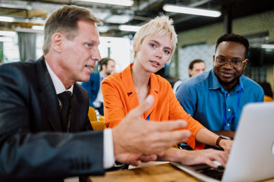 Business colleagues working at office