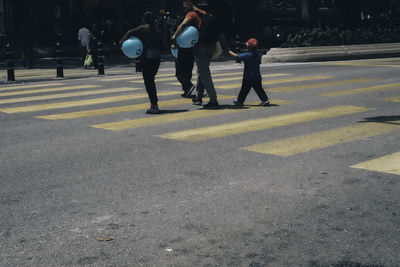 People walking on road