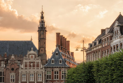 Low angle view of cathedral against sky in city during sunset