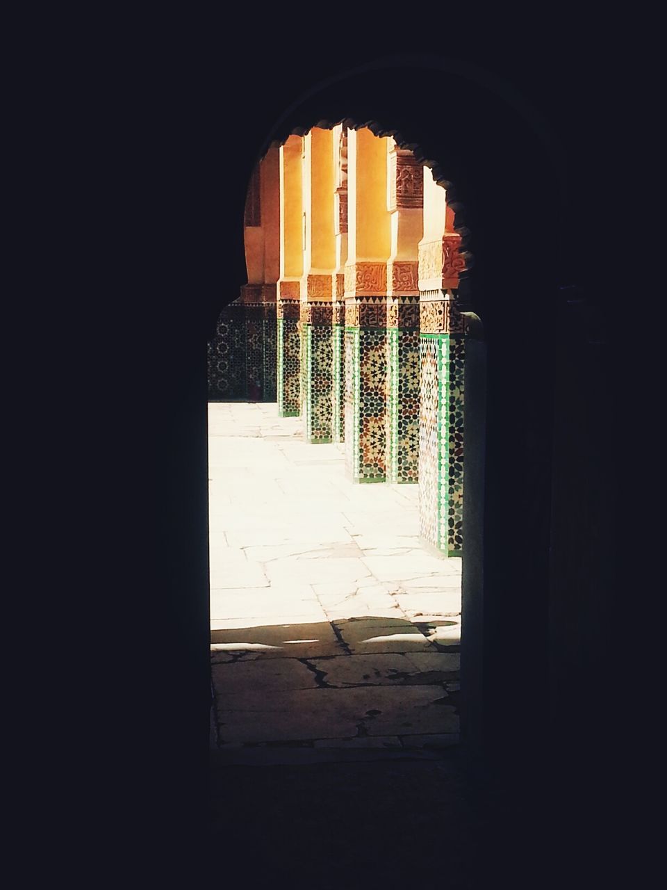 indoors, architecture, built structure, arch, window, corridor, the way forward, building exterior, empty, building, entrance, archway, sunlight, illuminated, dark, door, absence, shadow, wall - building feature, doorway