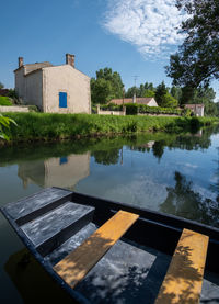 Reflection of building and trees in lake