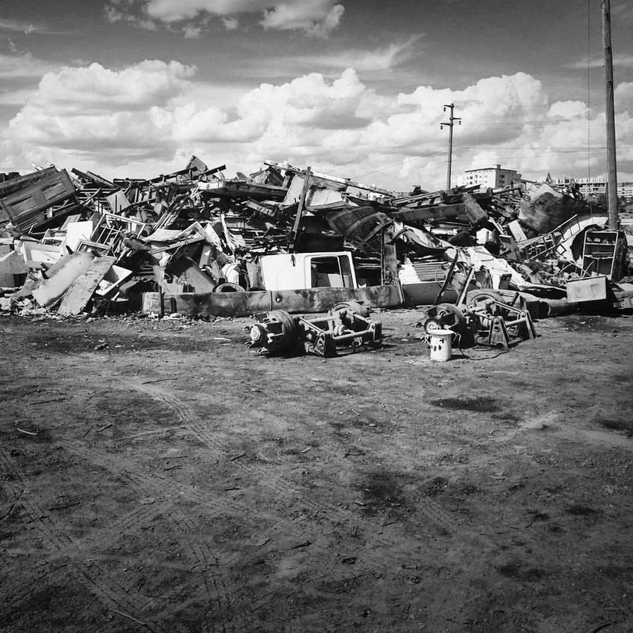 garbage, pollution, cloud - sky, garbage dump, environmental issues, environment, junkyard, day, architecture, sky, waste management, large group of objects, no people, recycling, heap, built structure, nature, environmental damage, field, damaged, dirty, ruined, demolished