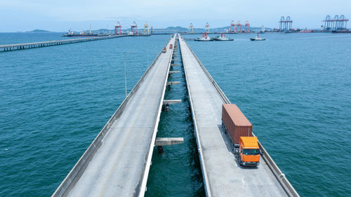 High angle view of bridge over sea against sky