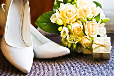 Close-up of white rose on table