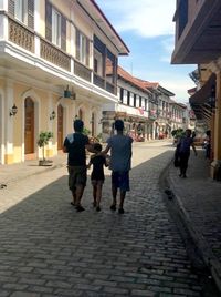 People walking on city street